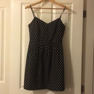 Black polka-dot dress